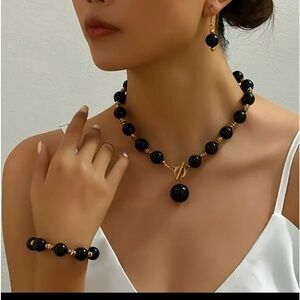 - NWT Vintage Imitation Pearl Jewelry Set Necklace, Earrings and Bracelet.